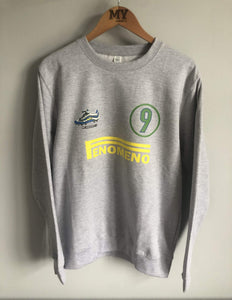Full front view of the Ronaldo “OFenómeno” sweatshirt in heather grey hanging on a wooden hanger, featuring a bold graphic of Ronaldo and the Nike Mercurial R9 boot.